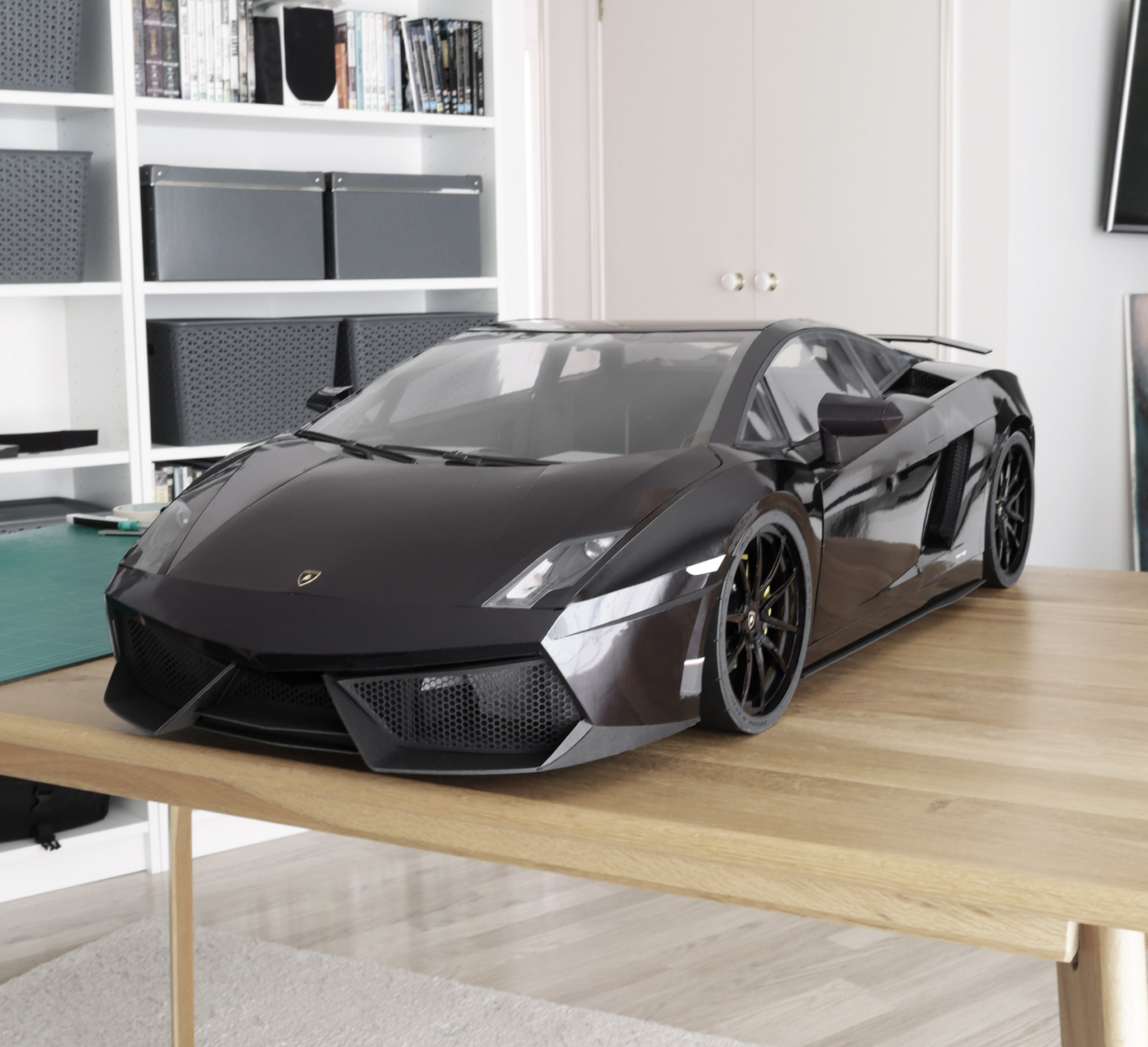 I'd created wheels based on the incredible Strasse SV5 – they are my most favourite wheels ever for a Gallardo. Here they are fitted to the driver's side: black on black with no Superleggera stripe.