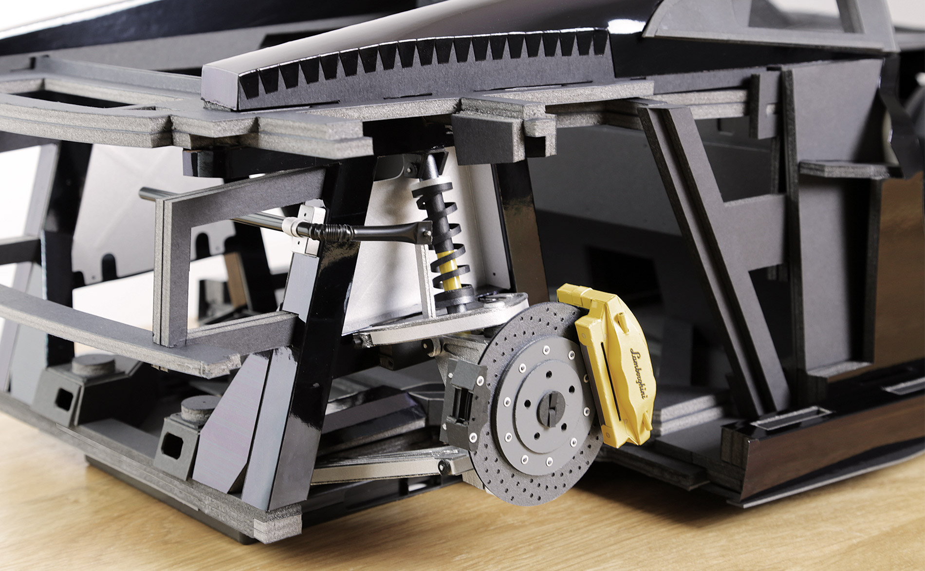 I’ve designed and made all of the parts for the rear suspension, brakes, and stabiliser bar. Here’s the completed assembly for the driver’s side.