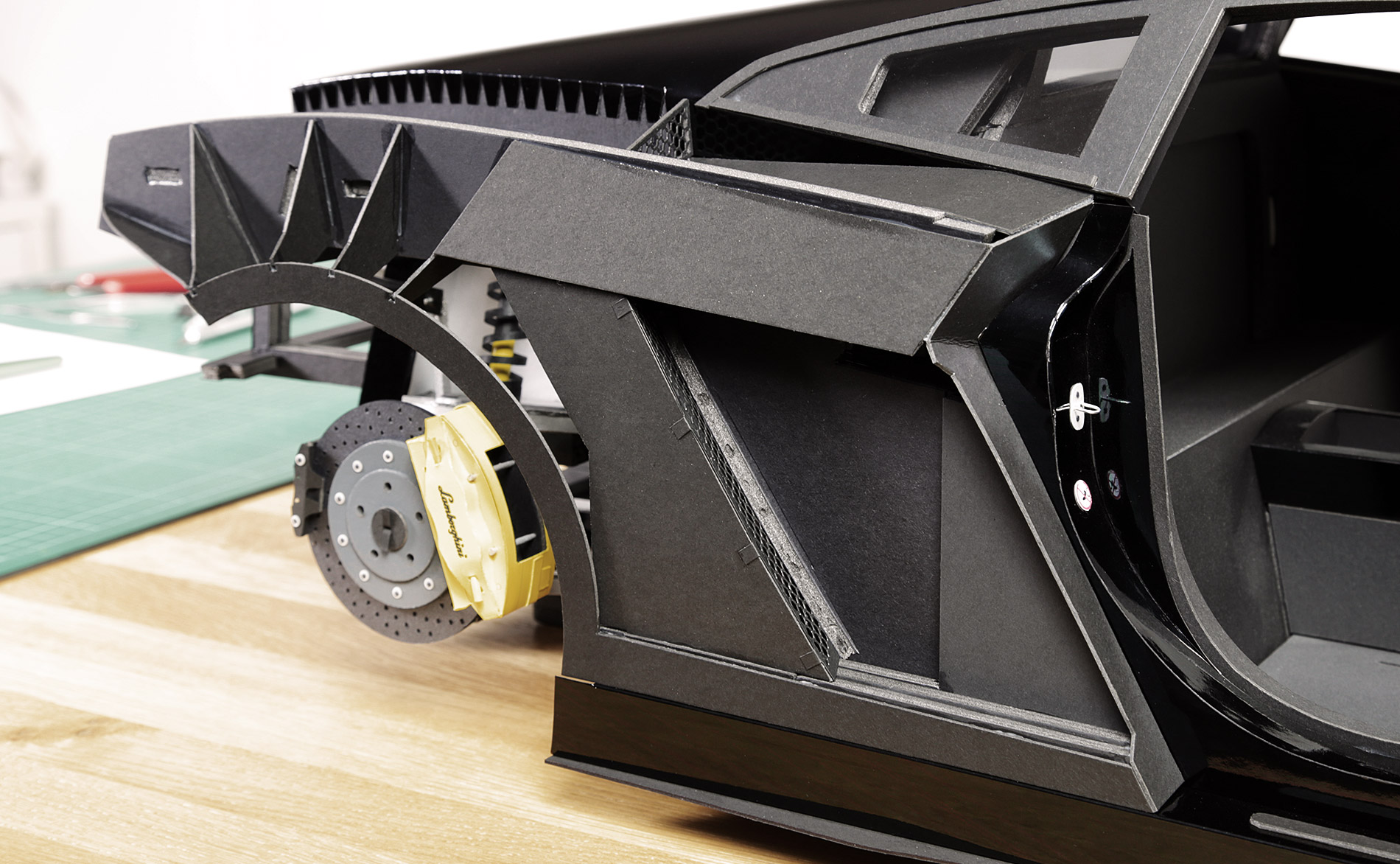 A view of the underlying structure I’d designed for the rear fenders (passenger’s side rear fender in this pic). Next I'll glue on the outer body panels, and the rear fenders will be done.