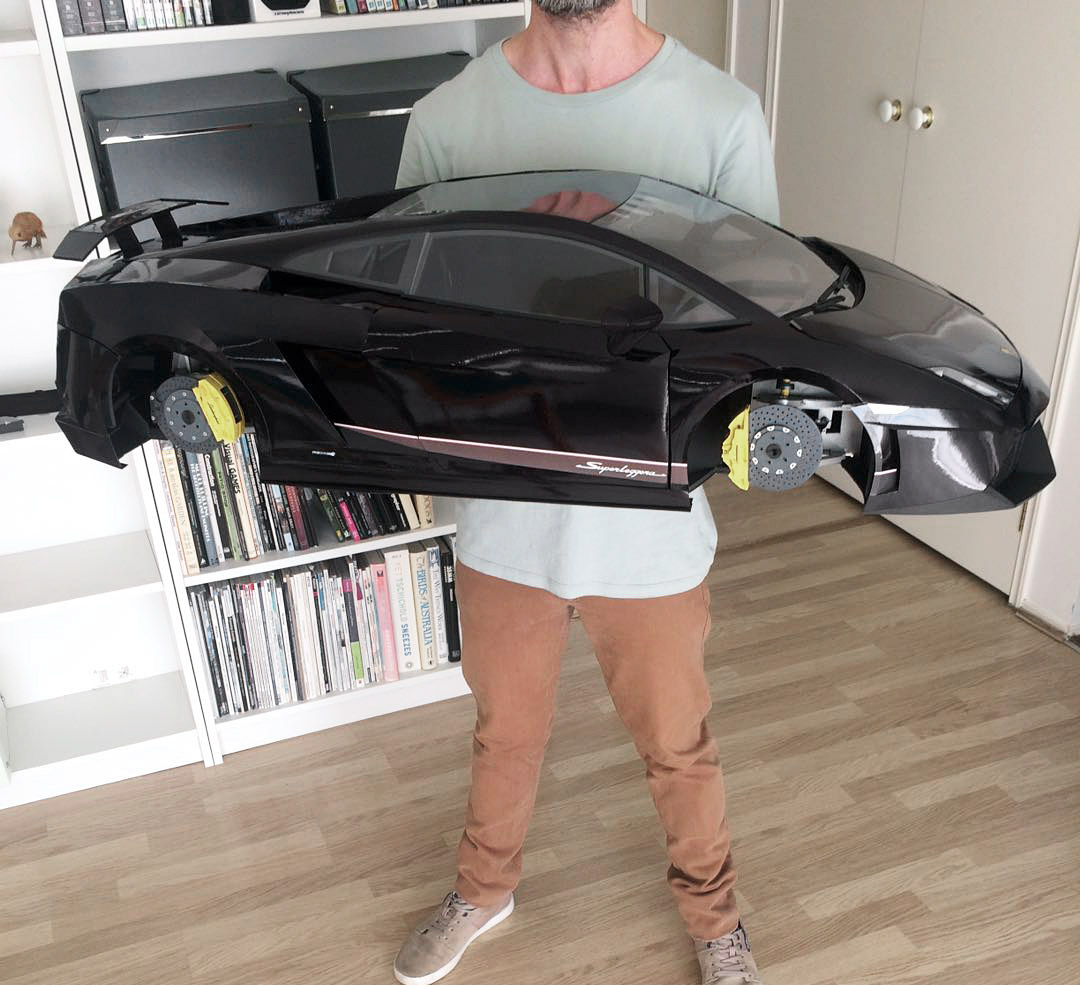 The completed body with me holding it for scale– it's a pretty decent size!