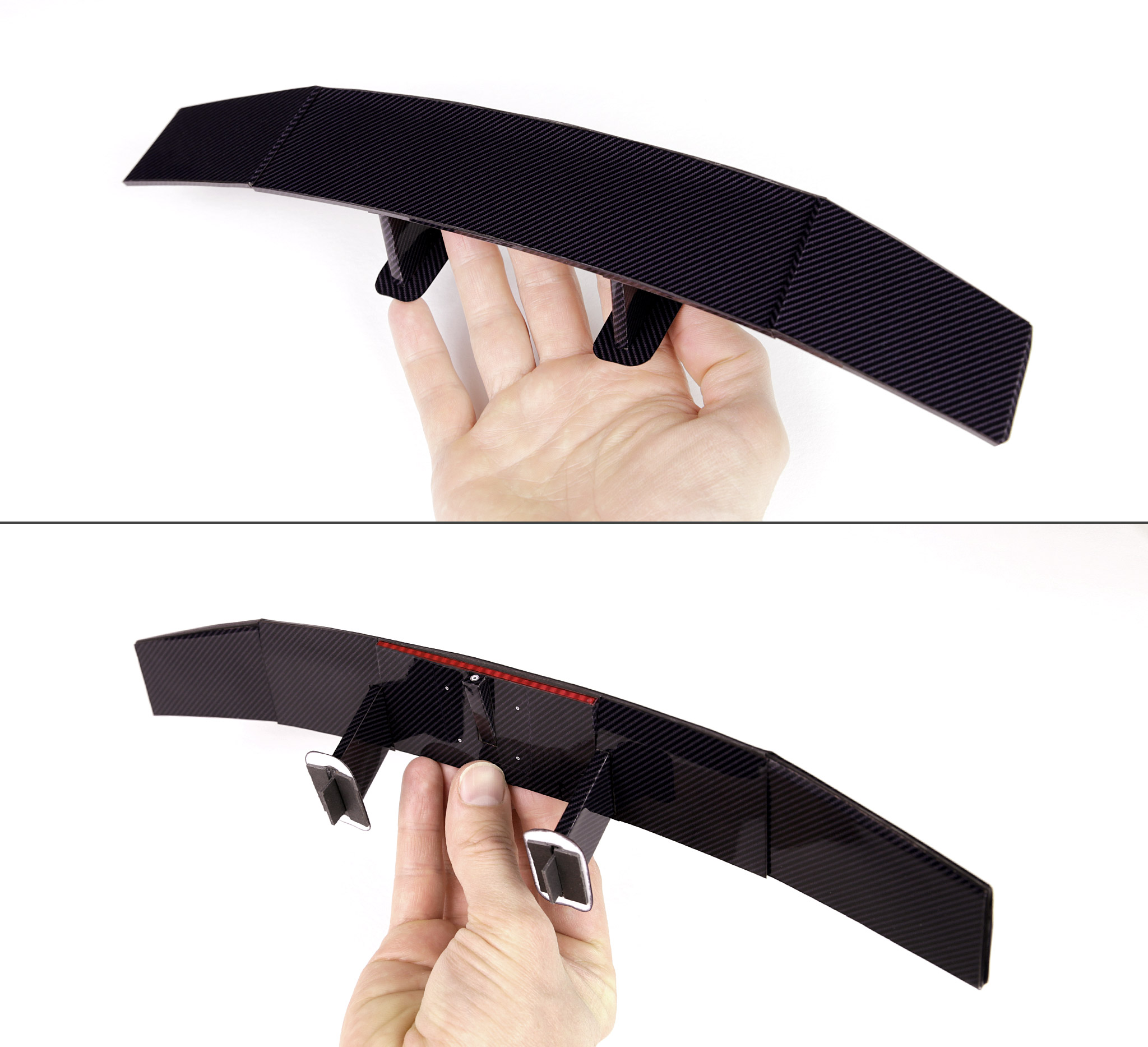 Here's what the completed rear wing looks like from the above and underneath. The simulated carbon fibre parts are made by first creating a carbon-fibre style texture in Illustrator, printing the parts photo paper, then cutting them all out by hand. It looks quite simple but it's actually made up of 29 separate parts.