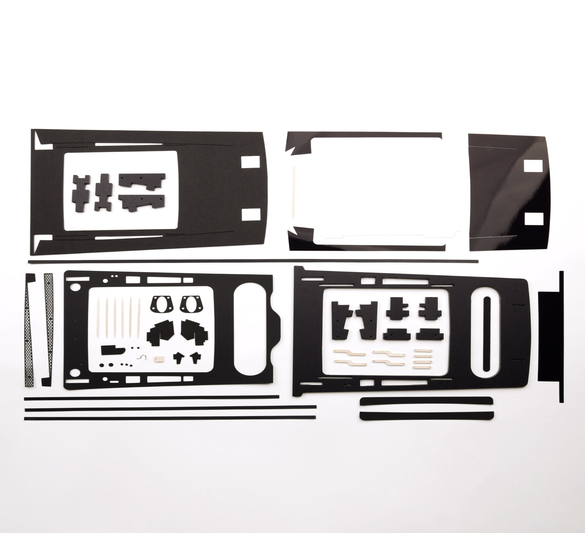 All the parts that make up the engine cover. I've designed these all from scratch and hand cut almost all of them. They are a mix of foam core board; card board; light card; acetate (clear plastic sheet); and small wooden pieces too. The engine cover is hinged and opens and closes like the real car.